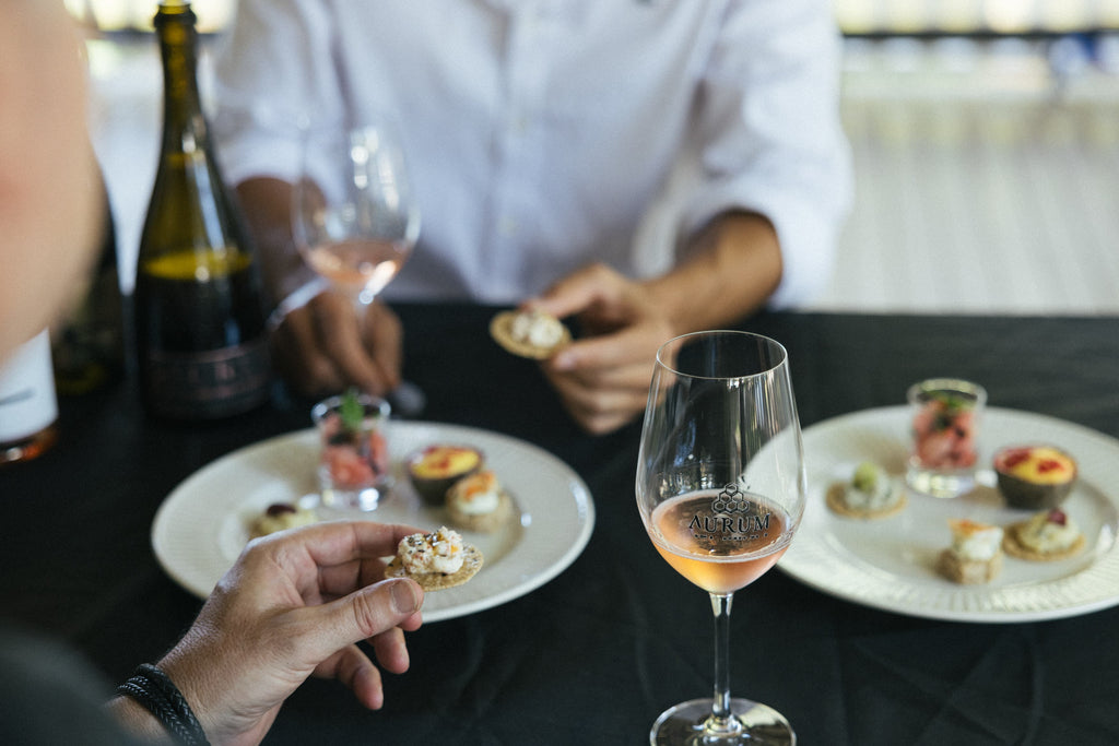 Guests at AURUM's Newrybar Hall cellar door enjoying a guided tasting